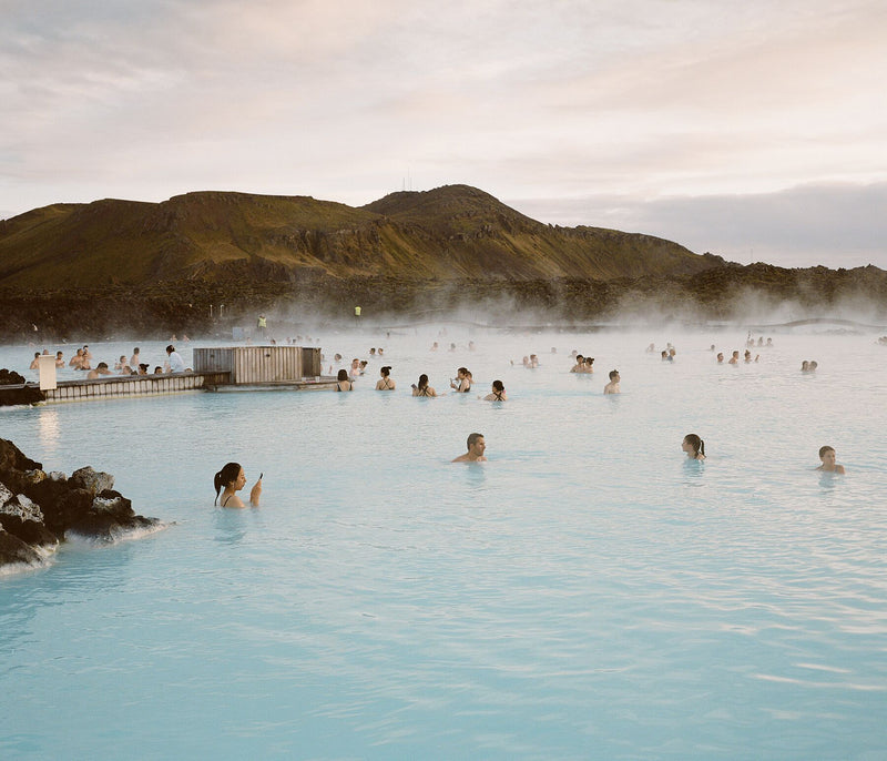 Crowd Of People In Lagoon