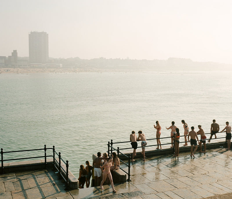 Swimmers On Pier