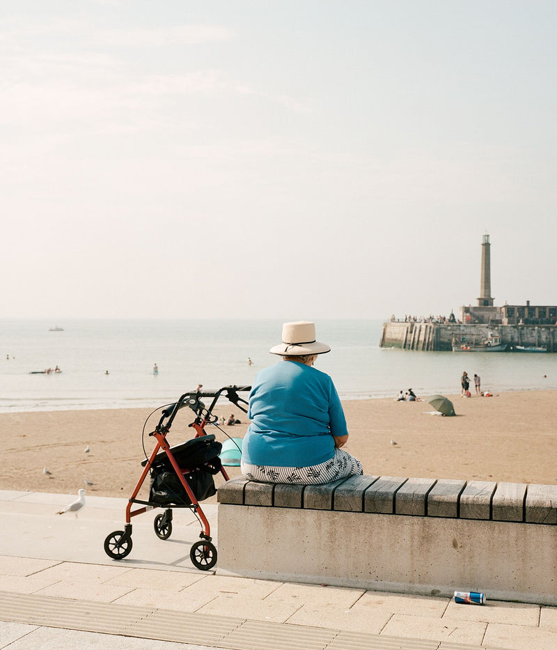 Woman Sitting On Bench